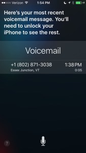 Screen shot of locked iPhone showing Siri reporting only on most recent new voicemail message